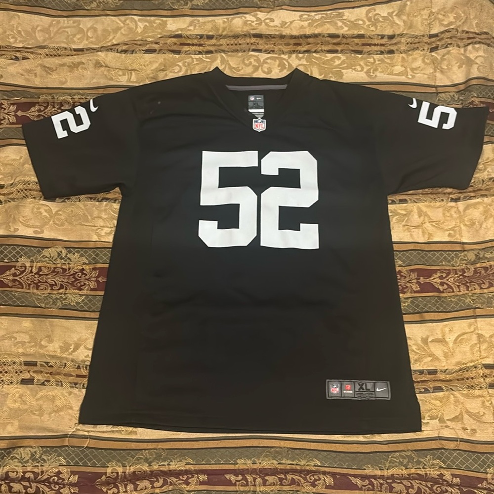 Sport station . NFL jersey , young boys . size 18 /20 black and gray # 52